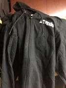 2 Storage Bins of Scare House Hoodies, 1 Bin of Merch Stands and Displays