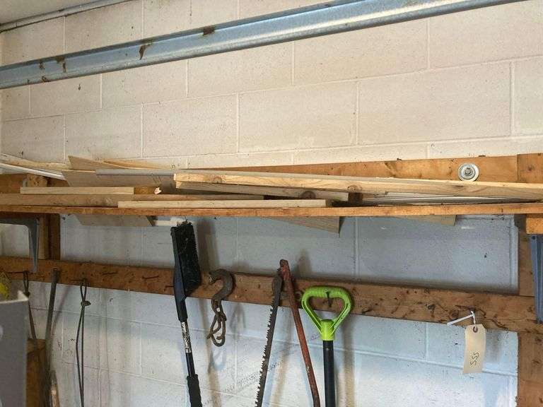 Wooden Rack Approx 90in Long With Contents, Includes Shovel, Saw, and Wood