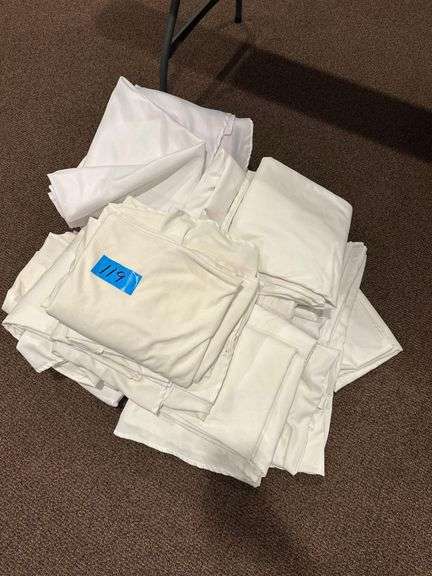 Large Pile of Tablecloths and Linens