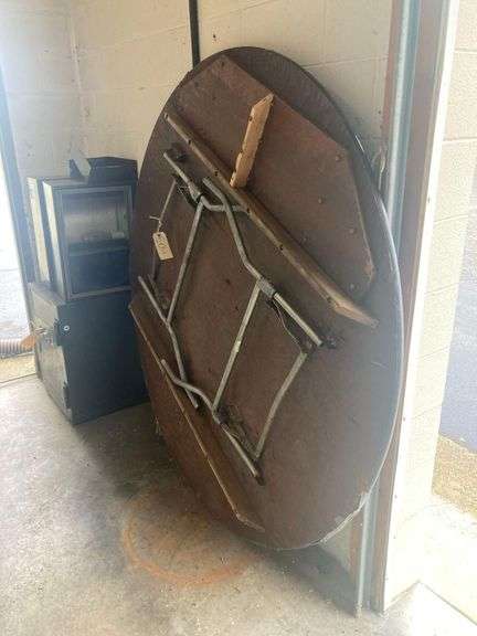 6ft Round Wooden Folding Table, Scratched Surface, Legs Held by Duct Tape