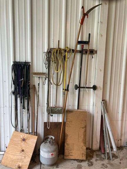 Manual Pole Saw, Push Magnet and Bungee Cords NOT INCLUDED - Contents of Wall Including Hand Tools, Brushes, and Propane Tank image