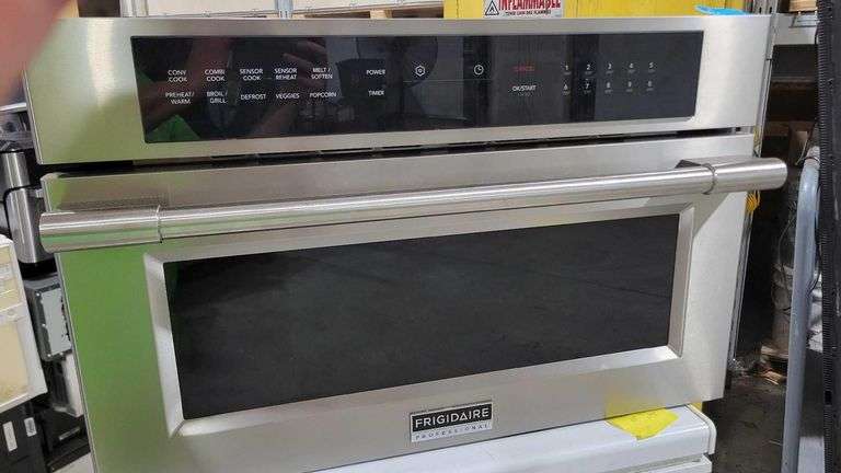 Frigidaire Professional 30" Built-In Convection Microwave Oven with Drop-Down Door FPMO3077TF. Pops breaker as soon as it's plugged in. Needs repaired. image