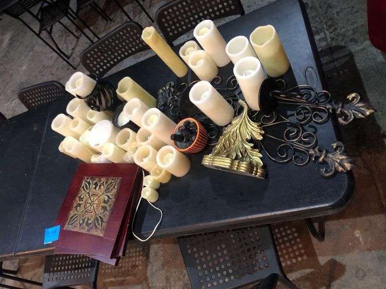 Many Various Sized Fake Candles, Wall Decorations, Essential Oils, Scent Blower, and Various Candle Holders