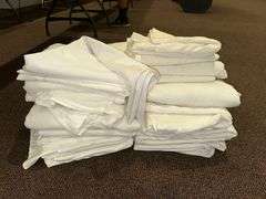 Large Pile of Tablecloths and Linens
