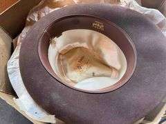 Bin Full of Cowboy Hats and Vintage Men’s Hats