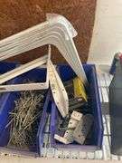 Lot of Nails, Assorted Bolts with Nuts, Chain for Chainsaw, and Miscellaneous Metal Parts