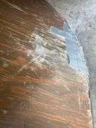 6ft Round Wooden Folding Table, Scratched Surface, Legs Held by Duct Tape