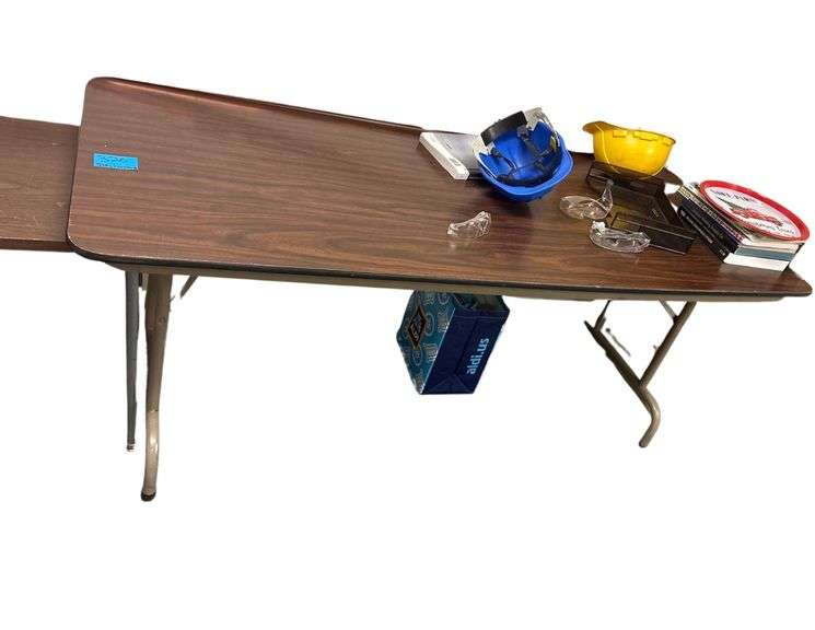 Table 72inx30in, Contents - Construction Hats, Books, Etc. image