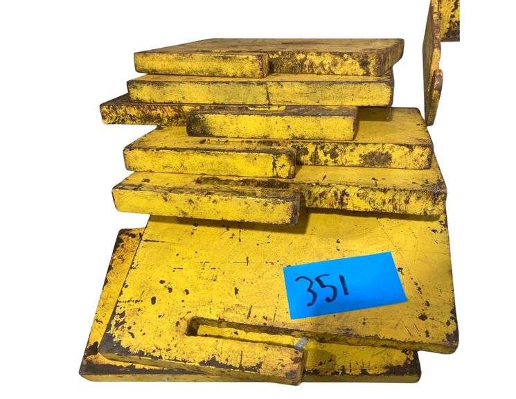 (7) 20+lb Iron Tractor Weights with Bracket image