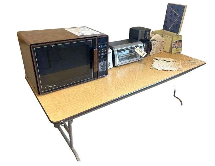 Hotpoint Microwave, Black and Decker Toast-R-Oven, Hamilton Beach Toaster, Mr. Coffee Machine - Includes 6 ft Table and Contents image