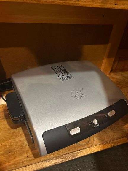 Contents of Island - George Foreman Grill, Sewing Machine, Waffle Iron, Food Processor image