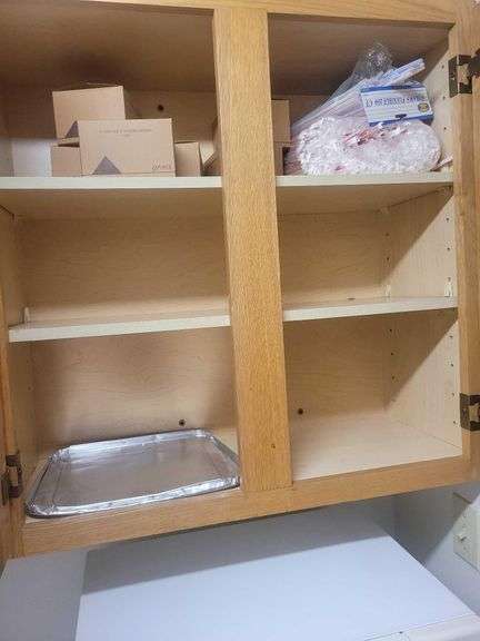 Contents in Cupboards - Straws - Coffee Stirrers - Plastic Lids - Plastic Silverware image