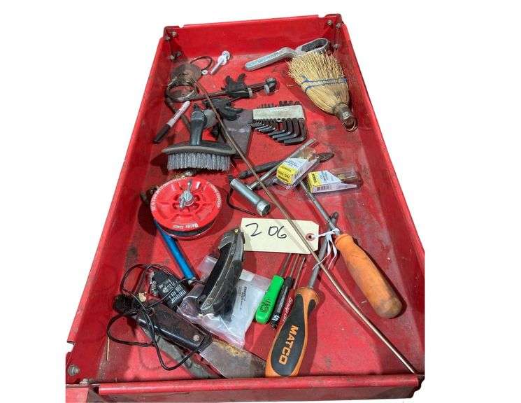 Contents of Cart Including Screwdrivers, Clamps, and Compression Fittings image