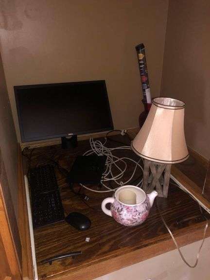 Contents Of Cupboard Including Lamp, Teapot, Vase, And Computer Setup image