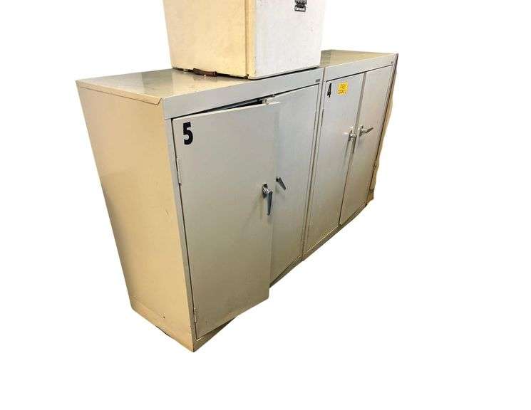 2 - Steel Cabinets 36in. L X 42in. H. X 18in. D. Contents Included image