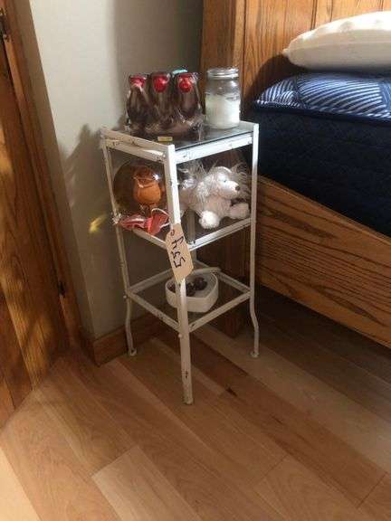 Stand 27” With Contents Including Candle, Glassware, and Stuffed Dog image