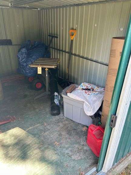 Contents of Shed, Right Side - Rollers, Gas Can, Tarp, Sawhorses, etc image
