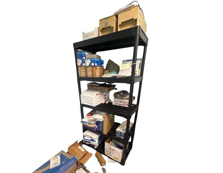 Storage Rack Containing Various Papers, Other Miscellaneous Items image