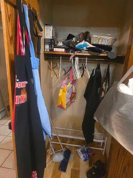 Contents on Closet- Various Items - Apron - Hangers - Light Bulbs - Dust Mop and More image