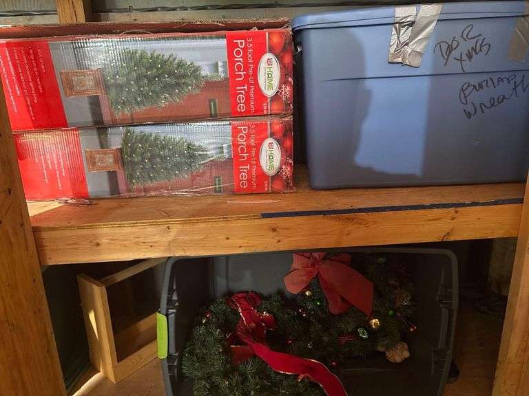 Contents of Cabinet including Christmas Decor, 2 Pre Lit Trees, Wreaths image