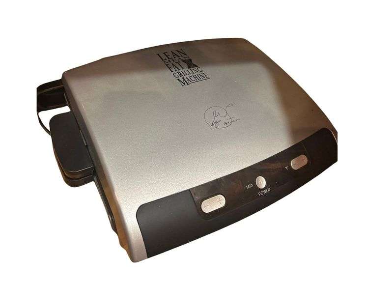 Contents of Island - George Foreman Grill, Sewing Machine, Waffle Iron, Food Processor image