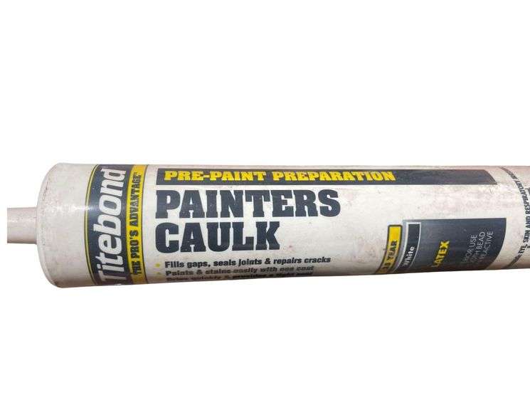 Box of Painter Caulk and other Various Adhesives Including Roof Cement image