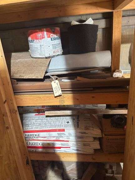 Contents of Cabinet including 4 Bundles of Shingles, Square Tubing image