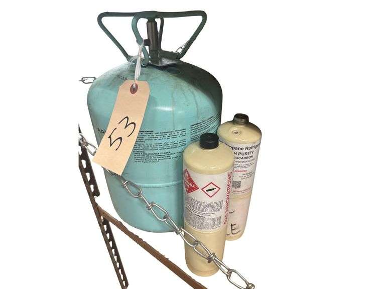 4 Refrigerant Cans Used image
