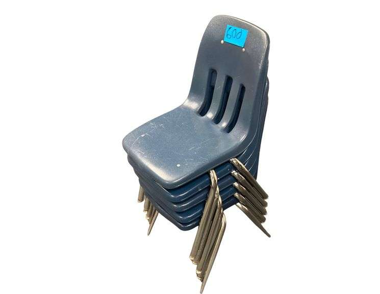 Five Plastic Chairs image