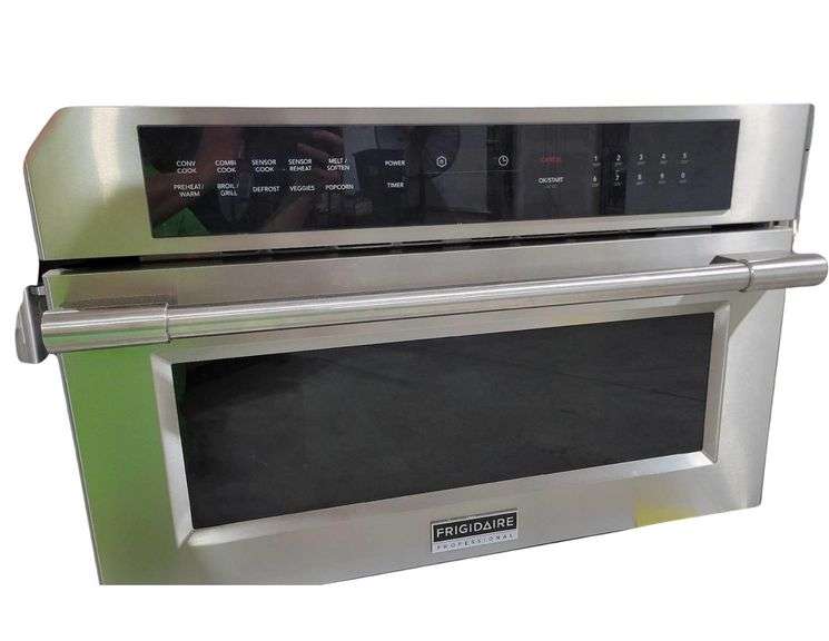 Frigidaire Professional 30" Built-In Convection Microwave Oven with Drop-Down Door FPMO3077TF. Pops breaker as soon as it's plugged in. Needs repaired. image