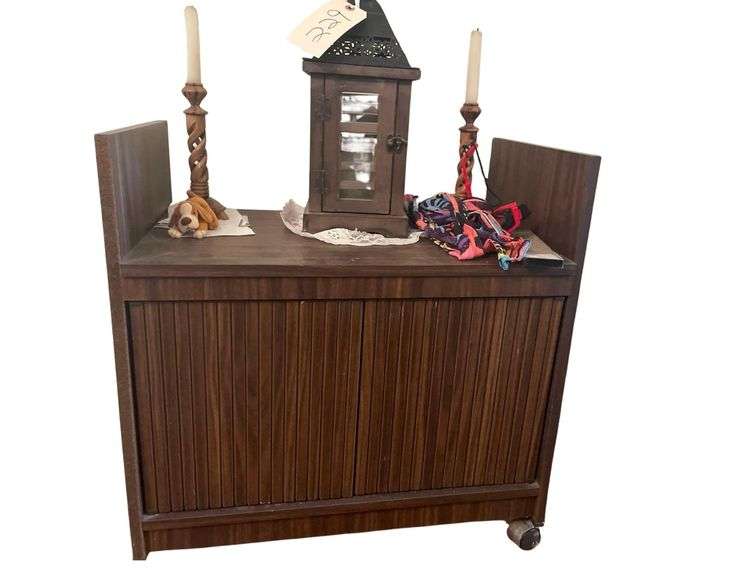 Wooden Cabinet on Wheels 2 Olive Wood Candle Holders With a Wood Lantern 16 Inches Tall image