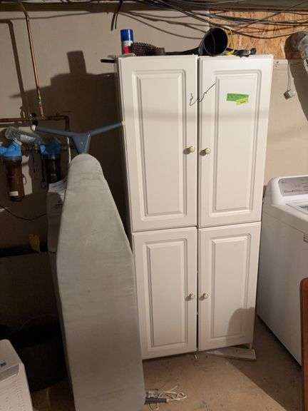 16D x 30L x 72H four door cabinet and contents shown, plus ironing board! image