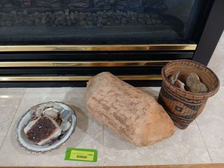 Geodes and other rocks and what appears to be part of a beaver eaten tree image