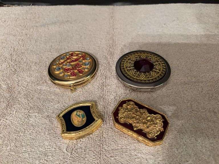 Compacts and two Estee Lauder solid perfume compacts image