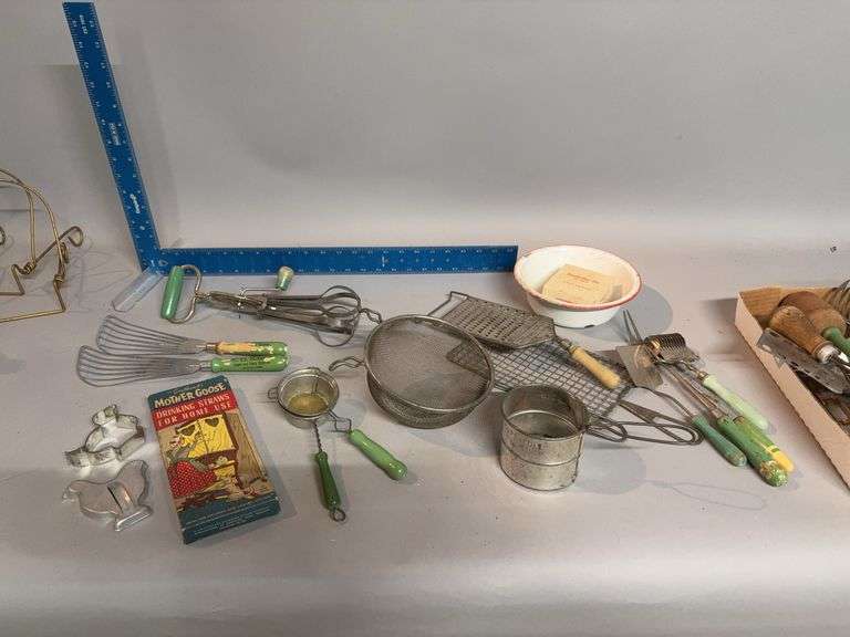 Box of vintage kitchen utensils, many green handles image