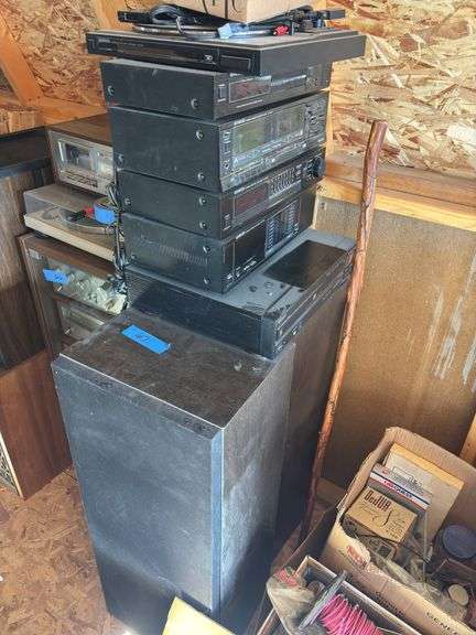 Kenwood stereo system includes tuner, double cassette deck, amplifier, additional amplifier, and a Sony five disc changer plus 2 large speakers image