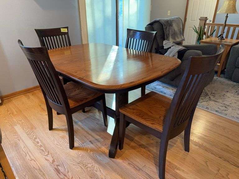 Oak dining table 40 x 58 w/ (2) 12" leaves and 4 dark stained chairs that match pedestal image