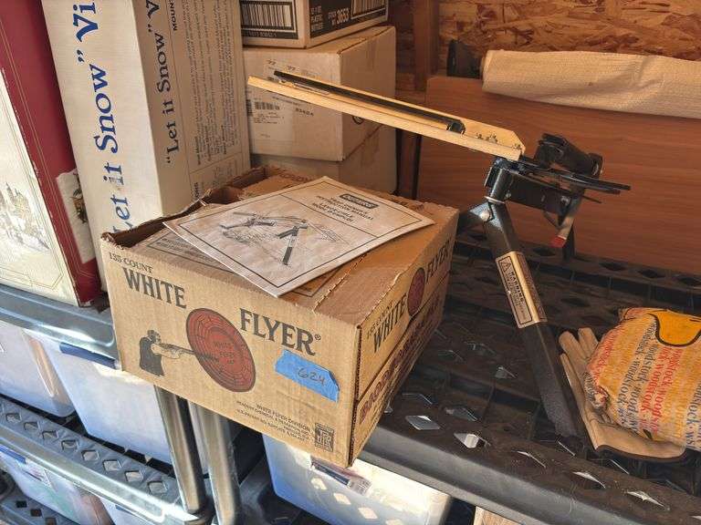 Outers trap thrower and partial box of traps image