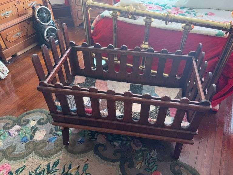 Early antique rocking cradle 21x37x31H and quilt image