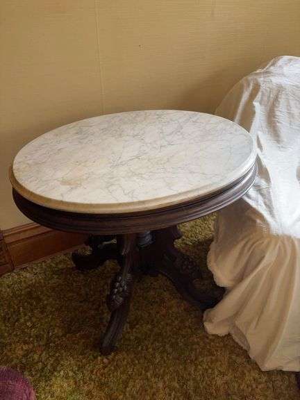 24x32x29H oval marble topped parlor table with grape leaf carved legs image