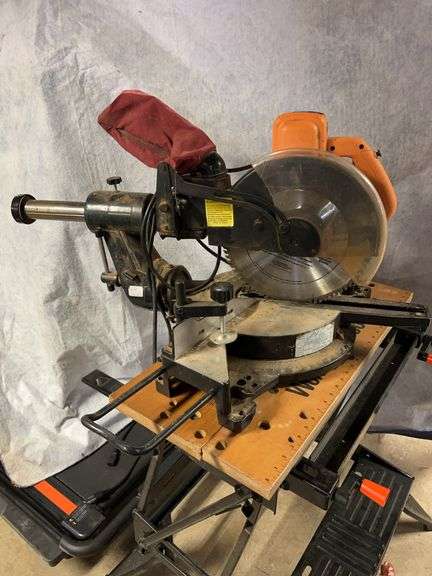 Chicago electric 12-in miter saw with double bevel slider on workmate 400. 4 -1/2-in Bessie vise. 8-in disc Sander with 1/8  horsepower motor. image