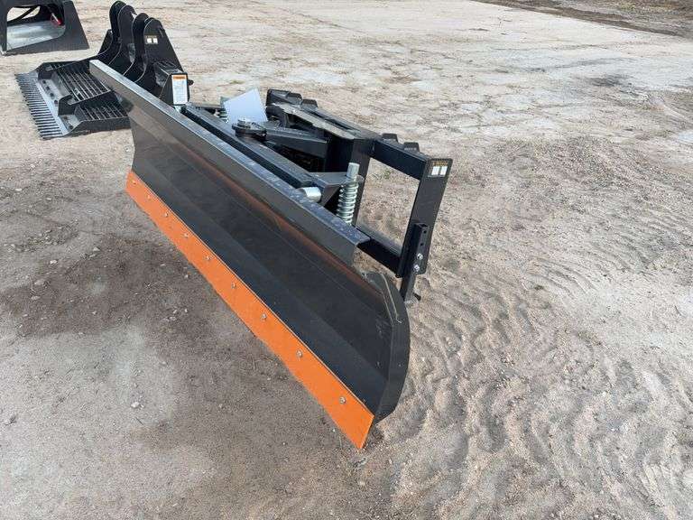 Skid Steer Dozer Blade	WOLVERINE DB-15-84W	"Unused 2025 Skid Steer Dozer Blade Overall Height 27.9in Overall Width 84in Overall Depth 33.2in. Cutting Edge Thickness 1/2-in. Angle 28 degrees left or right Product Weight 658 lb" image