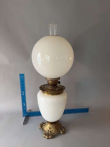 29” tall oil lamp w brass base and milk glass shade and font image