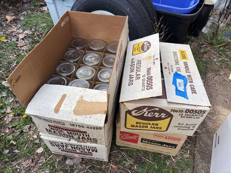 Four boxes of quart jars