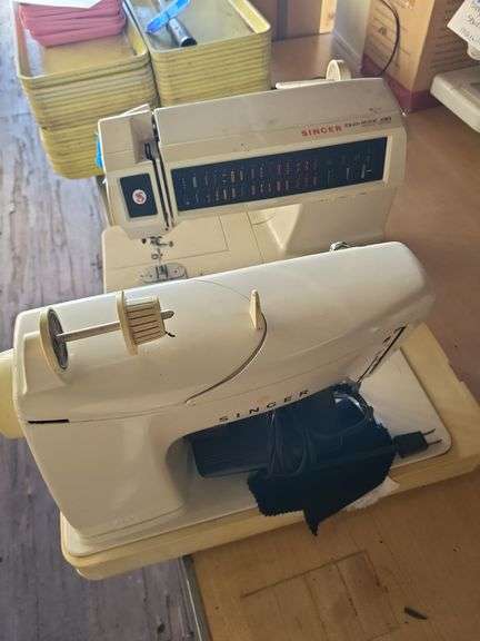 Two singer sewing machines