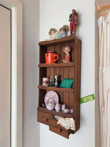 Wall shelf w things to dust image