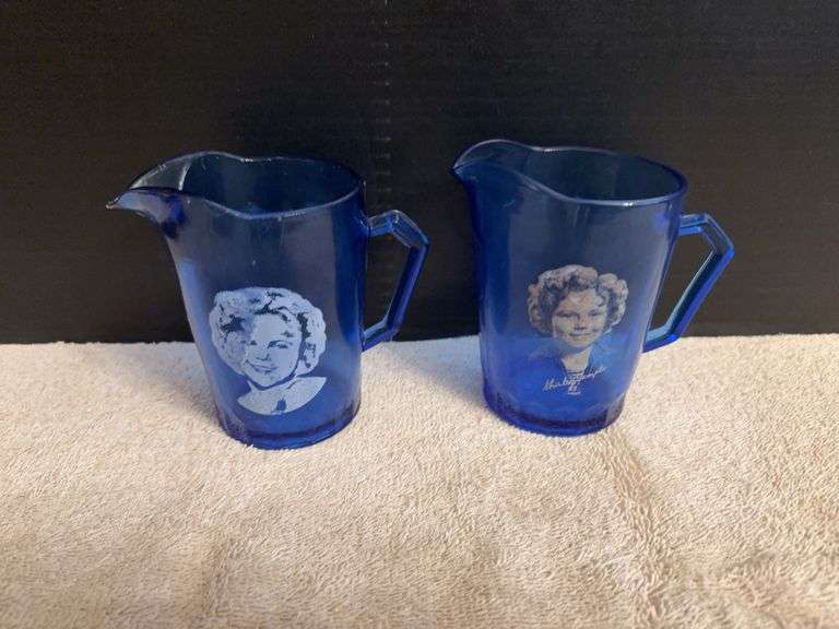 Two Shirley Temple pitchers, different designs image