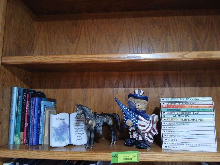 CS Lewis paperbacks, other books, a horse and a bear image