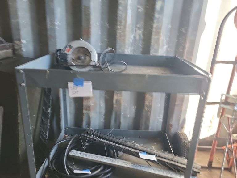 Roller cart with saw and hooks