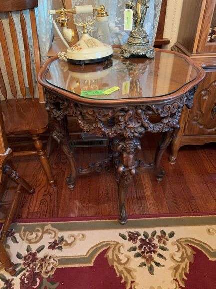 Intricately carved parlor table w/cherubs 27x27